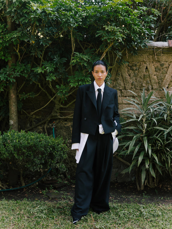 The Pinstripe Wool Wide Leg Pleated Trouser