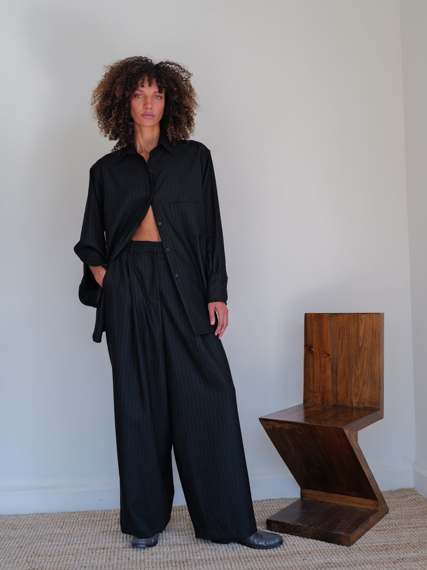 The Pinstripe Wool Wide Leg Pleated Trouser