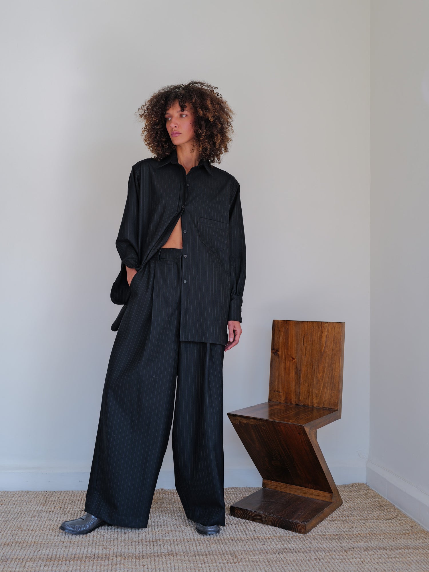 The Pinstripe Wool Wide Leg Pleated Trouser