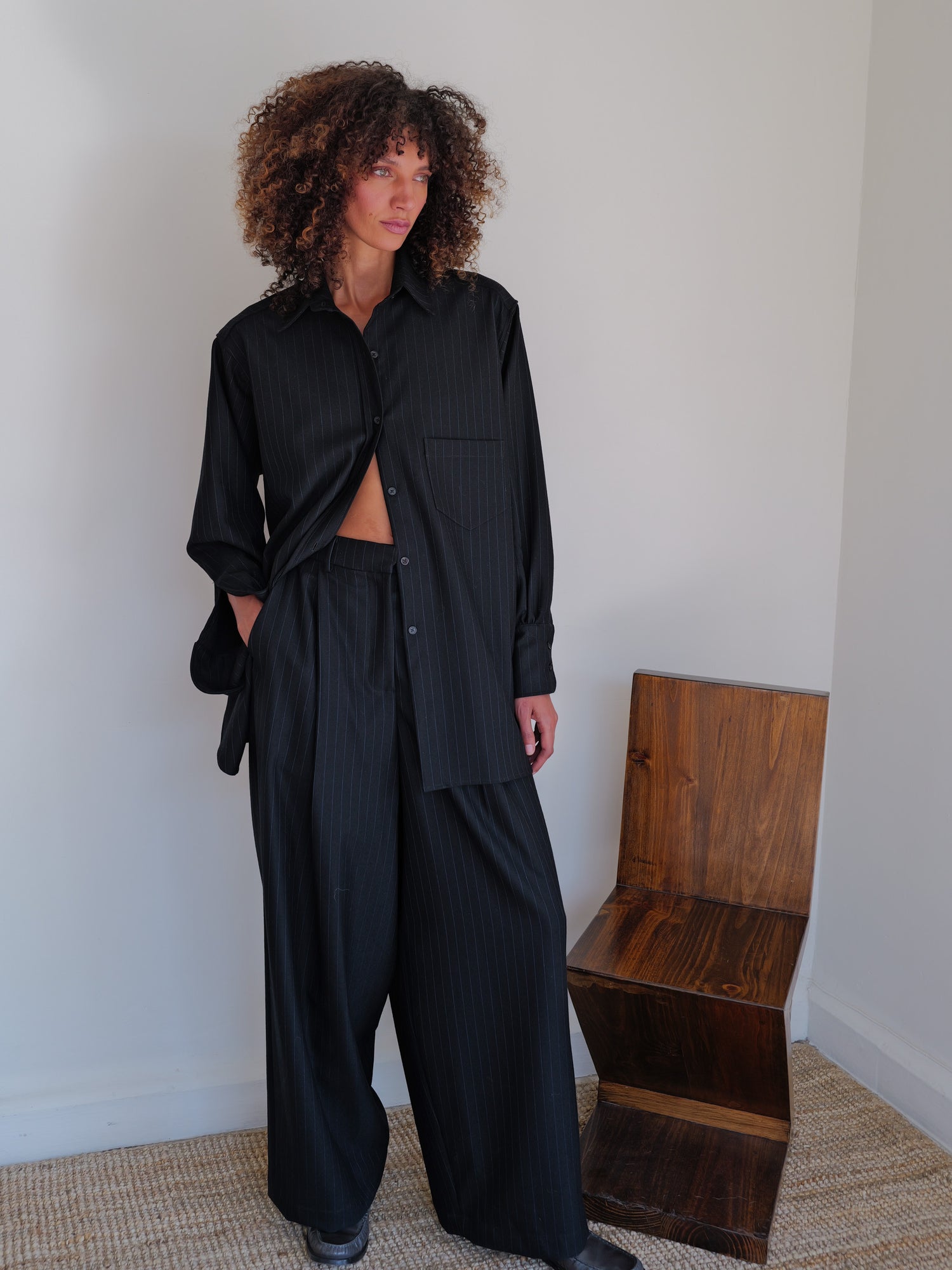 The Pinstripe Wool Wide Leg Pleated Trouser